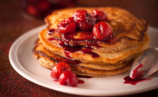 Pancakes with sour cherry sauce
