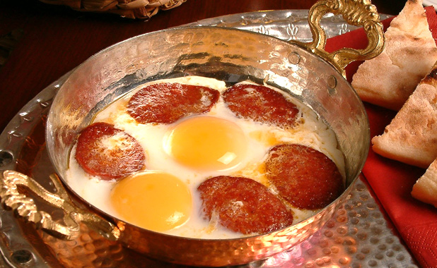Fried eggs with spicy Turkish sausage 