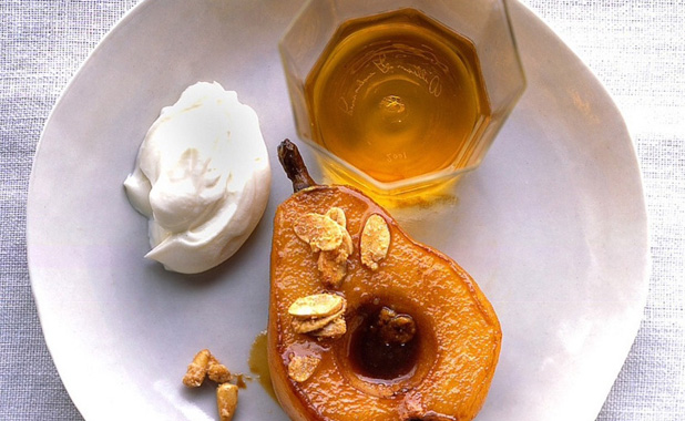 Poached and caramelized pear dressed with cognac and whipped cream