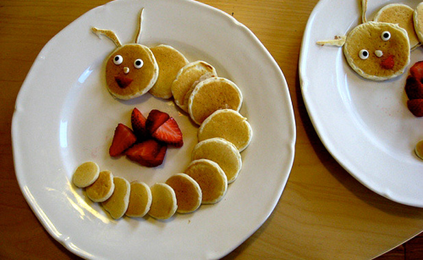 Caterpillar pancakes with strawberries